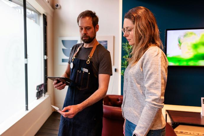 a man and a woman standing in a room